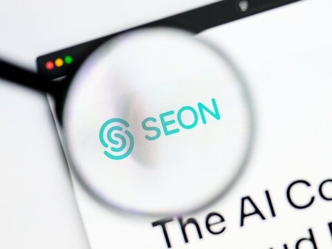 Milan, Italy 2026, 5 Jul Closeup of SEON website page on a laptop screen. Focus on SEON logo under a magnifying glass.