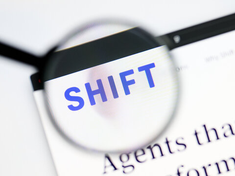 Milan, Italy 2026, 5 Jul Closeup of Shift Technology website page on a laptop screen. Focus on Shift Technology logo under a magnifying glass.