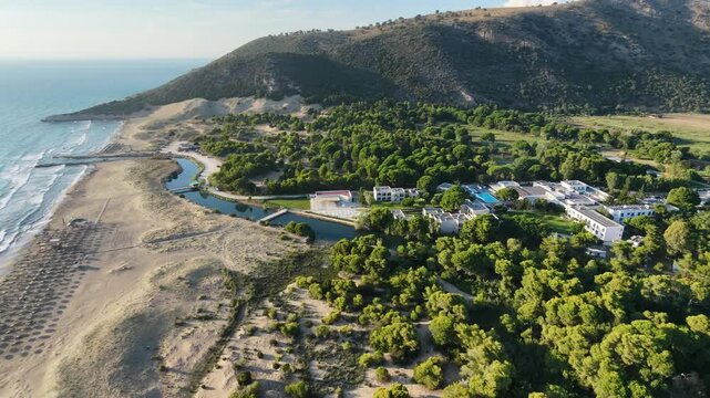 Kalogria, Achaea is a small coastal settlement and renowned sandy beach located in Western Greece, roughly 45 km southwest of your location in Patras. Famous for its 9-kilometer golden shoreline, turq