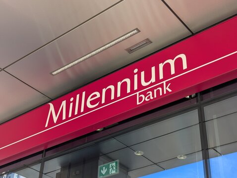 Warsaw, Poland,May 03, 2026. Red modern illuminated signage of Millennium Bank corporate office building in the urban area. High quality photograph.