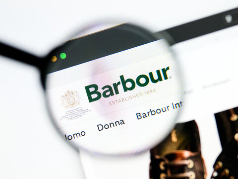 Milan, Italy 2026, 5 Jul Closeup of Barbour website page on a laptop screen. Focus on Barbour logo under a magnifying glass.