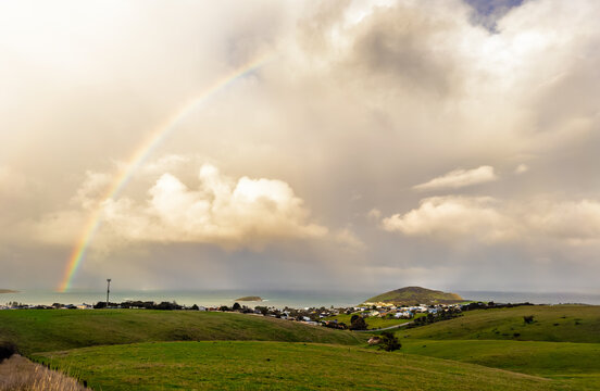 Rainbow and clouds over Encounter Bay and The Bluff in South Australia