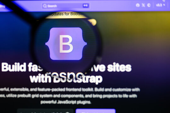 Milan, Italy 2026, 5 Jul Closeup of Bootstrap website page on a laptop screen. Focus on Bootstrap logo under a magnifying glass.