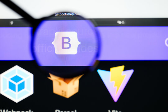 Milan, Italy 2026, 5 Jul Closeup of Bootstrap website page on a laptop screen. Focus on Bootstrap logo under a magnifying glass.