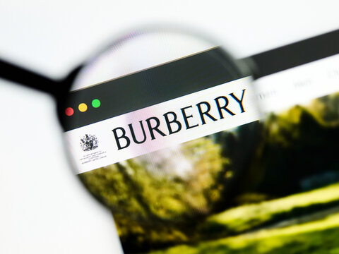 Milan, Italy 2026, 5 Jul Closeup of Burberry website page on a laptop screen. Focus on Burberry logo under a magnifying glass.