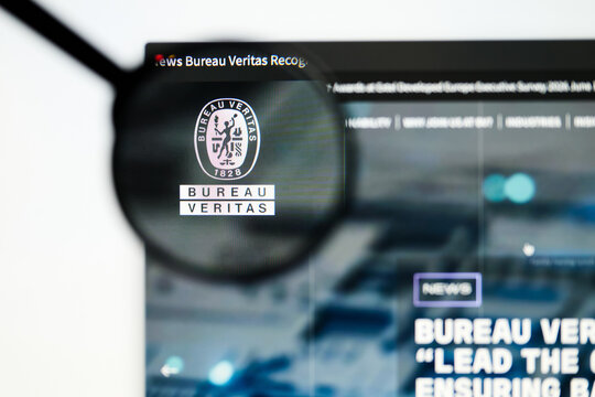 Milan, Italy 2026, 5 Jul Closeup of Bureau Veritas website page on a laptop screen. Focus on Bureau Veritas logo under a magnifying glass.