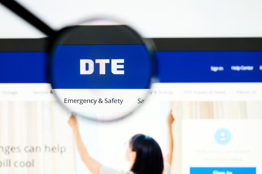 Milan, Italy 2026, 5 Jul Closeup of DTE Energy website page on a laptop screen. Focus on DTE Energy logo under a magnifying glass.