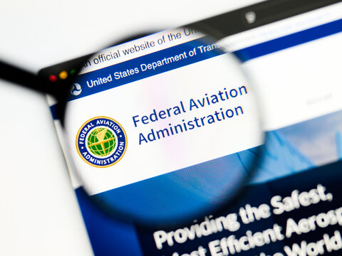Milan, Italy 2026, 5 Jul Closeup of Federal Aviation Administration website page on a laptop screen. Focus on Federal Aviation Administration logo under a magnifying glass.