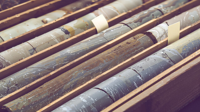 Geological rock core samples in wooden storage trays