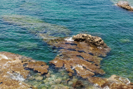 Exposed Intertidal Littoral Platform of Volcanic Hyaloclastite Tuff at Playa el Confital during low tide