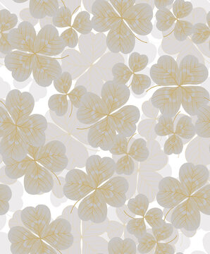 Seamless elegant botanical clover pattern featuring sophisticated gold veined leaves and soft grey silhouettes on a white background