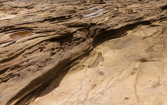 Exposed Intertidal Littoral Platform of Volcanic Hyaloclastite Tuff at Playa el Confital during low tide