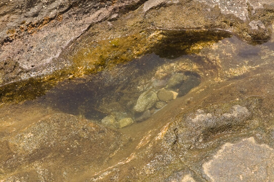 Exposed Intertidal Littoral Platform of Volcanic Hyaloclastite Tuff at Playa el Confital during low tide