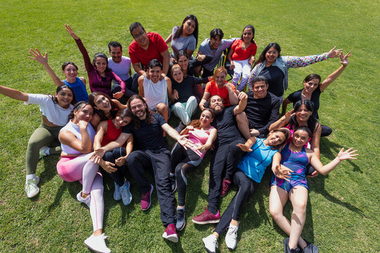 portrait of Latin sporty group of people after training workout outdoors in Mexico Latin America, large and diverse group of hispanic people of different ages and multi age