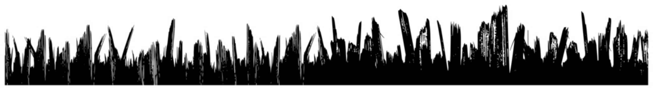 Sharp wood splinters and grass silhouettes forming a horizontal border design