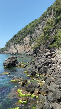 Rocky Black Sea Cliff with Moss Covered Shoreline at Inkumu Beach, Bartin, Turkey