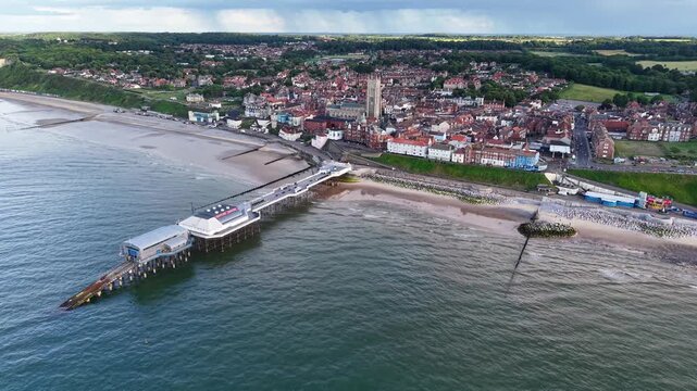 Drone shot of Cromer coastal town and sandy beach in Norfolk, UK