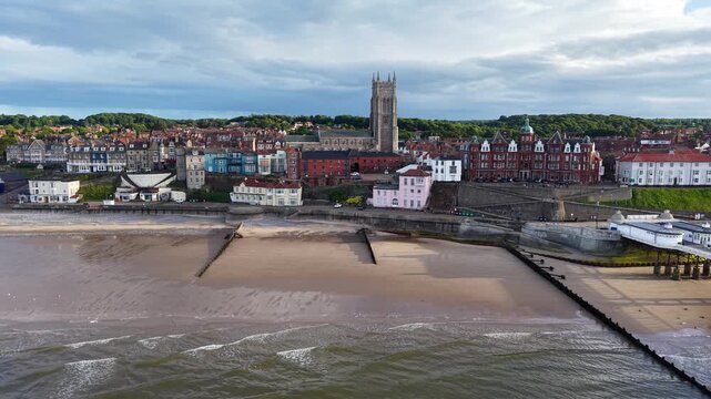 Aerial view of coastal architecture and beach in Cromer town, UK