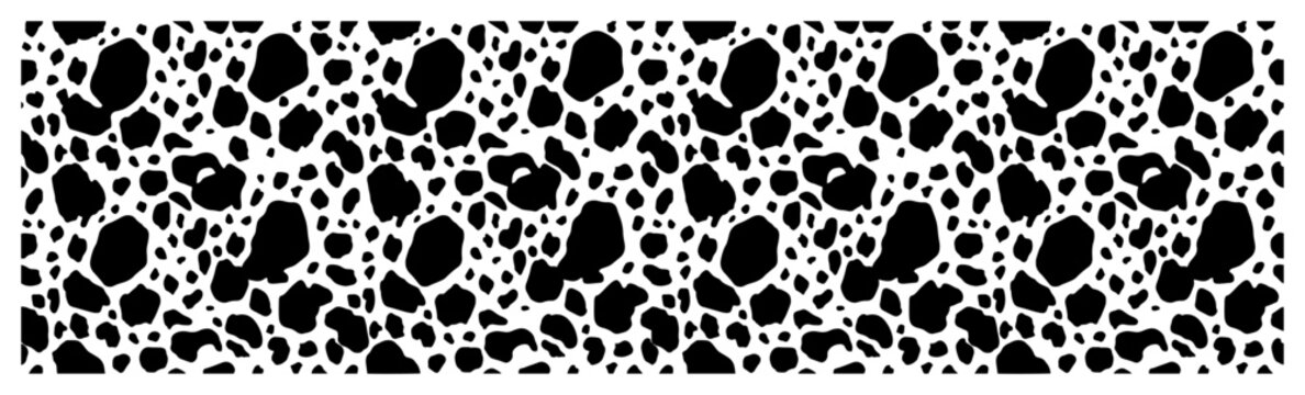 Dense animal spots pattern with organic dalmatian print texture in black and white