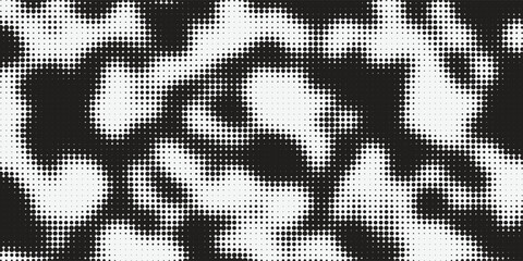 Monochrome halftone background with dense abstract liquid camouflage dot pattern eps10 © Aku