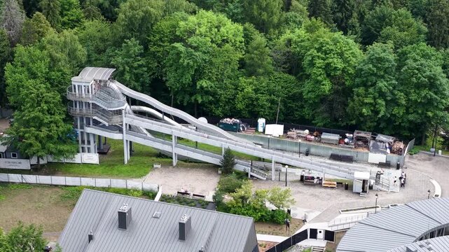 Aerial footage of mountain slide attraction in Krynica Zdroj town, Poland