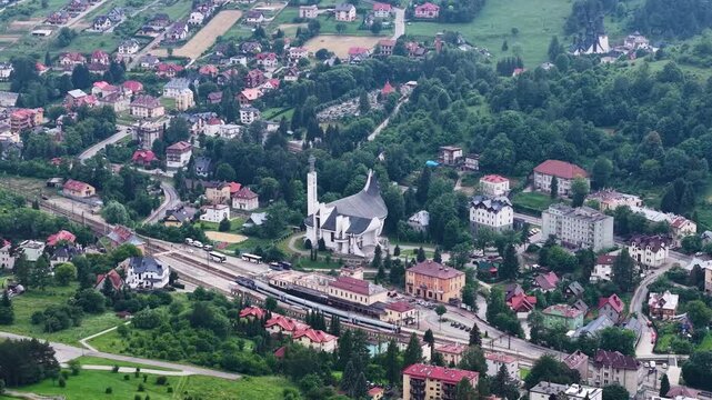 Aerial view of railway station and cityscape in Krynica Zdroj spa town, Poland