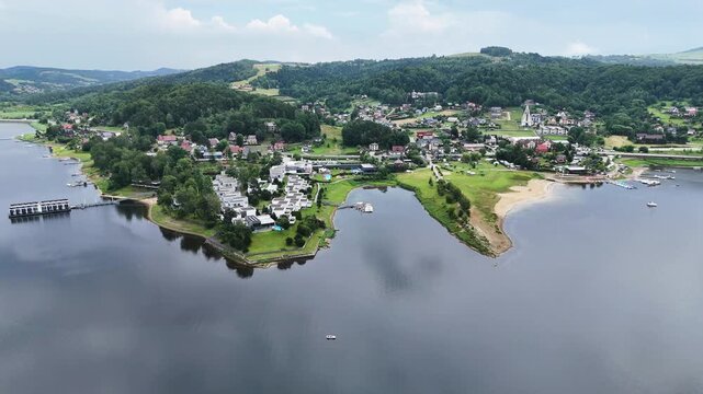 Drone shot of Grodek nad Dunajcem village at Roznow lake in Poland