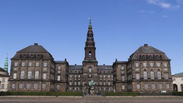 Wide view of main facade and square at Christiansborg Palace in Copenhagen