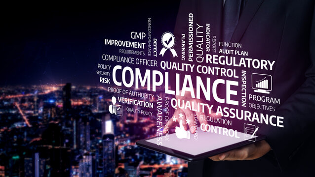 A business professional stands against a city skyline, presenting compliance concepts on a digital tablet, symbolizing quality control and assurance in modern business practices. Tessel
