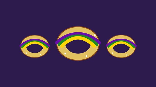 Three Floating Mardi Gras King Cake Donuts With Colorful Icing
