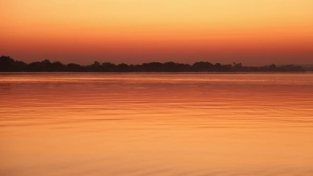boats on the Zambezi River at sunrise, Zambia, Africa