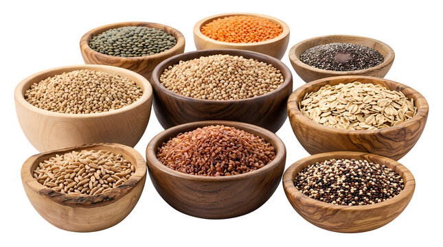 Assortment of organic grains legumes and seeds in wooden bowls isolated on transparent.