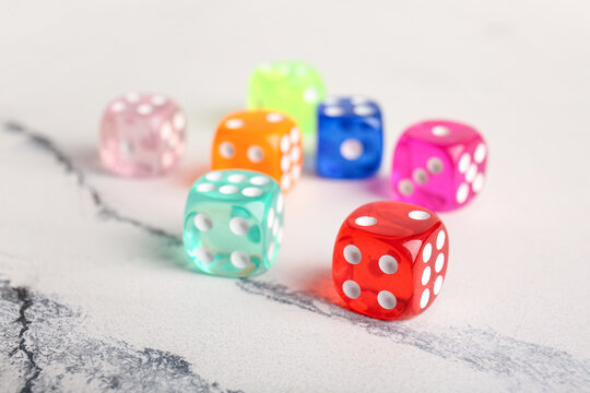 Different dices on light background