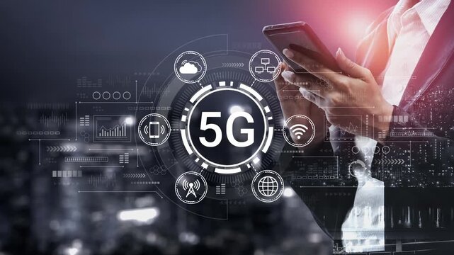 Businessman Using Smartphone with 5G Technology Overlay and Digital Interface in Modern Urban Environment at Night. Entropy.