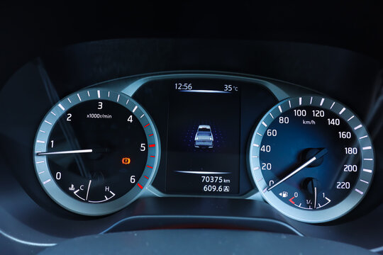 Car dashboard instrument panel speedometer tachometer digital display mileage gauge vehicle interior