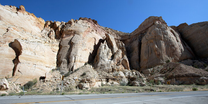 Ultra-wide panoramic image of dramatic rocky cliffs along Utah&rsquo;s Scenic Byway 95, the Bicentennial Highway