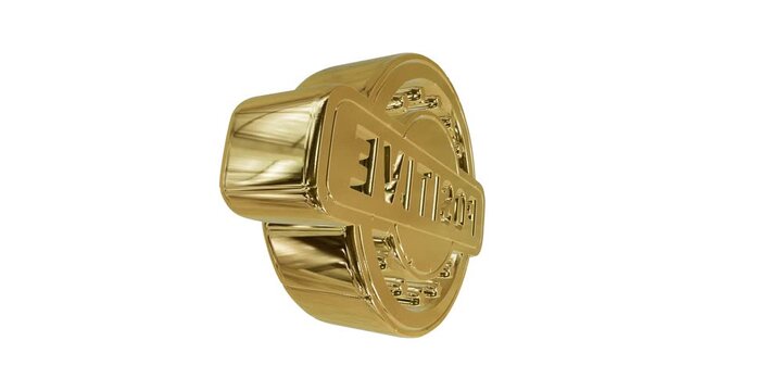 Shiny gold stamp with the word positive isolated on a simple surface for business and branding design