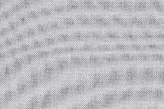 Light grey fabric cloth texture background, seamless pattern of natural textile.