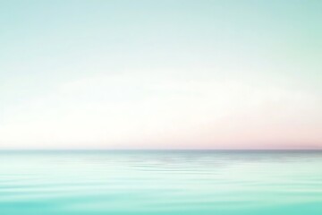 Fototapeta premium A serene ocean horizon with soft pastel colors in a minimalist seascape view