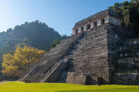 Mayan Temple of Inscriptions pyramid at sunrise, Palenque, Mexico.
