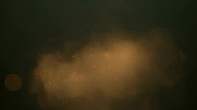 Abstract golden dust cloud on dark background, animated background with glowing particle mist, soft light, and haze, featuring brown glow and abstract smoke on dark backdrop for SEO search visibility