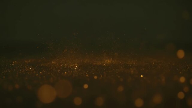 Abstract background animation with golden glow, dust, sparkle, bokeh, and floating particles on dark blurred field, creating soft elegant motion and warm calm atmosphere for SEO search visibility