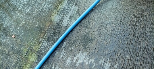 Blue hose for water on the street © andreas