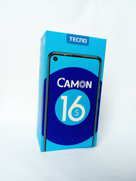 Tecno smartphone paper box package on white background. Camon 16 S phone box designed by Tecno. An android phone with fingerprint and proximity sensor and dual flash. Kumasi, Ghana - December 9, 2025