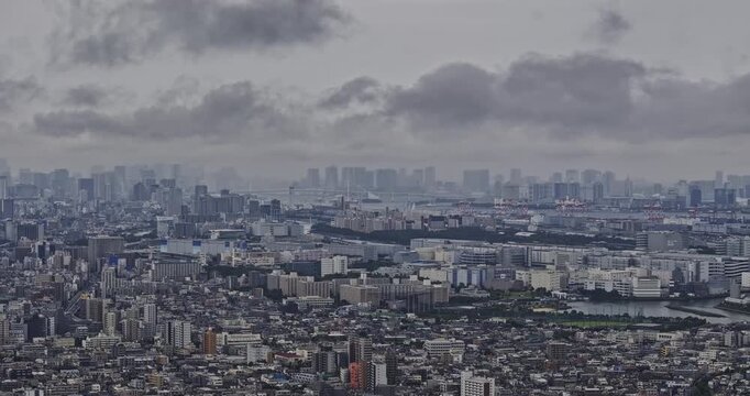 Tokyo Japan Aerial v221 zoomed drone flyover Nishikojiya and Omorihigashi, Ota capturing densely populated downtown cityscape against overcast cloud sky - Shot with Mavic 3 Pro Cine - October 2023