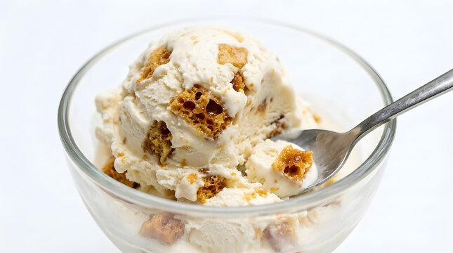 Hokey pokey ice cream from New Zealand with silver spoon on white background. Shot in close up perfect for advertising or marketing use purposes