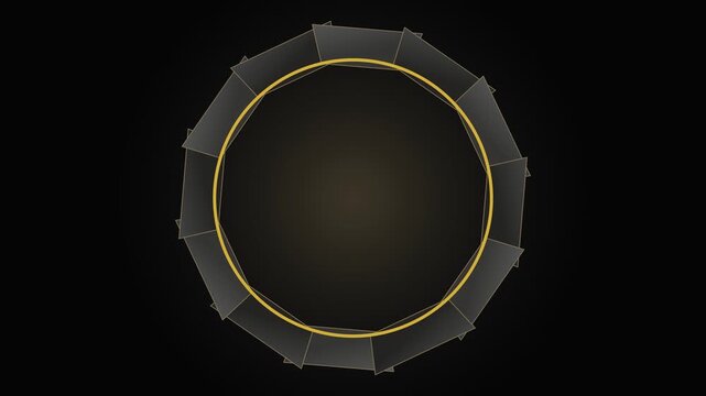 Macro top view of a geometric black and gold professional studio light modifier on a dark background