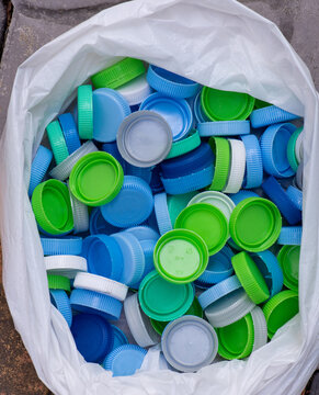 plastic bottle caps waiting to be taken to recycle.