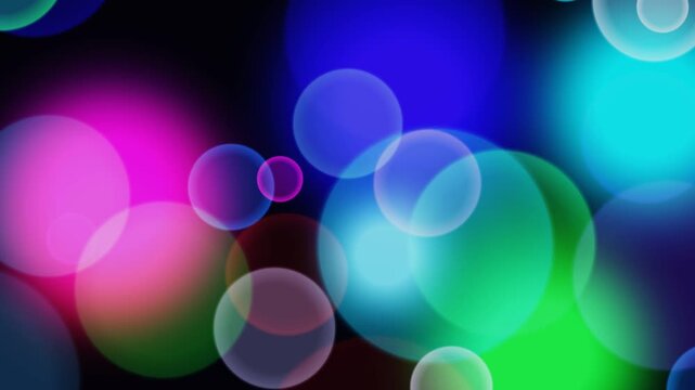 Multicolored circular light patterns perfect for backgrounds, digital art, advertisements, and vibrant design projects requiring neon and glowing effects.