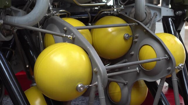 Close-up view of a Soviet rocket body showcased at an aerospace exhibition. Large-scale spacecraft structure featuring historic engineering, metal construction, and iconic design elements from the
